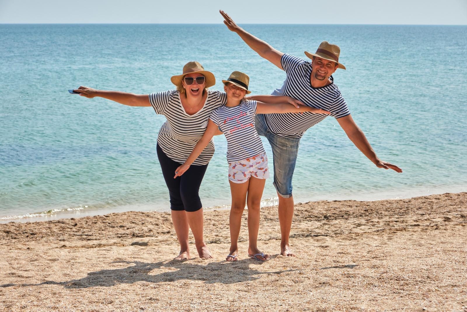 Next to the testimonial: a happy client family on vacation (with permission). Square.
